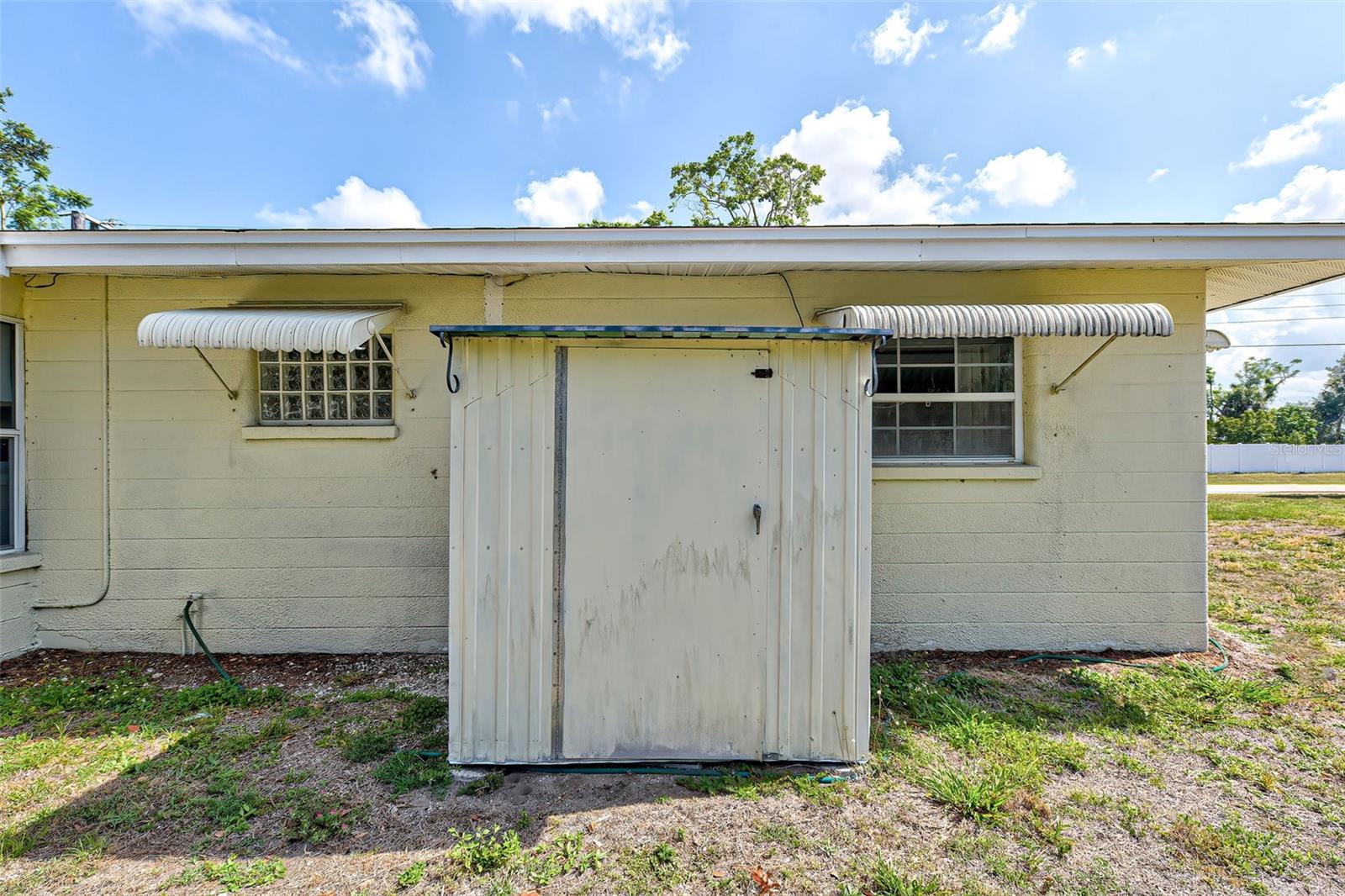 TOOL SHED IN THE BACKYARD