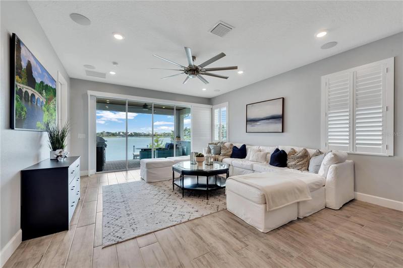 It's a nice open plan with the great room open to the kitchen and you can see that million dollar view from entering the front door, kitchen and great room.  All the rooms have shutters.