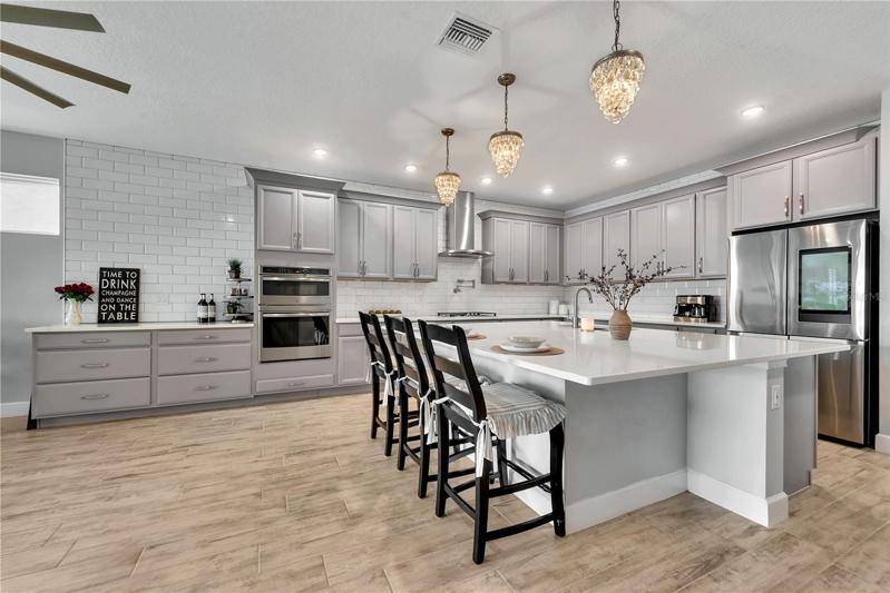 Wood look tile throughout for easy care.
