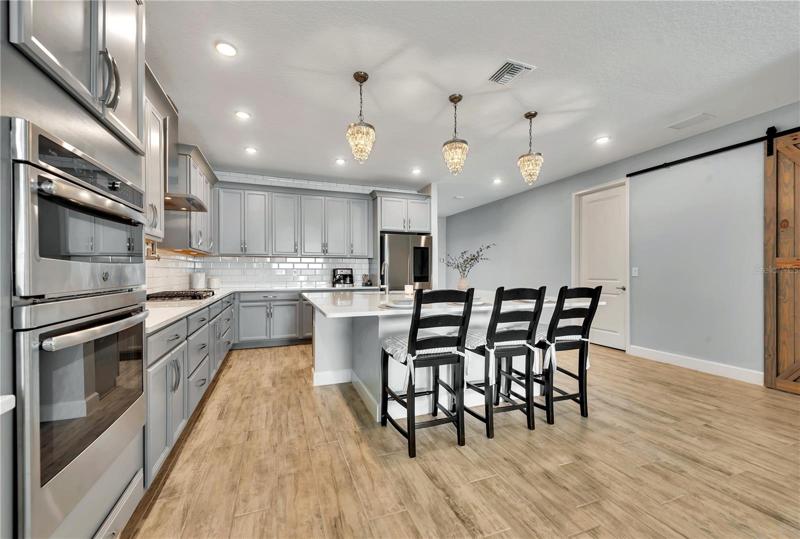 This room is currently set up as a dining room, but has endless possibilities for whatever you need.