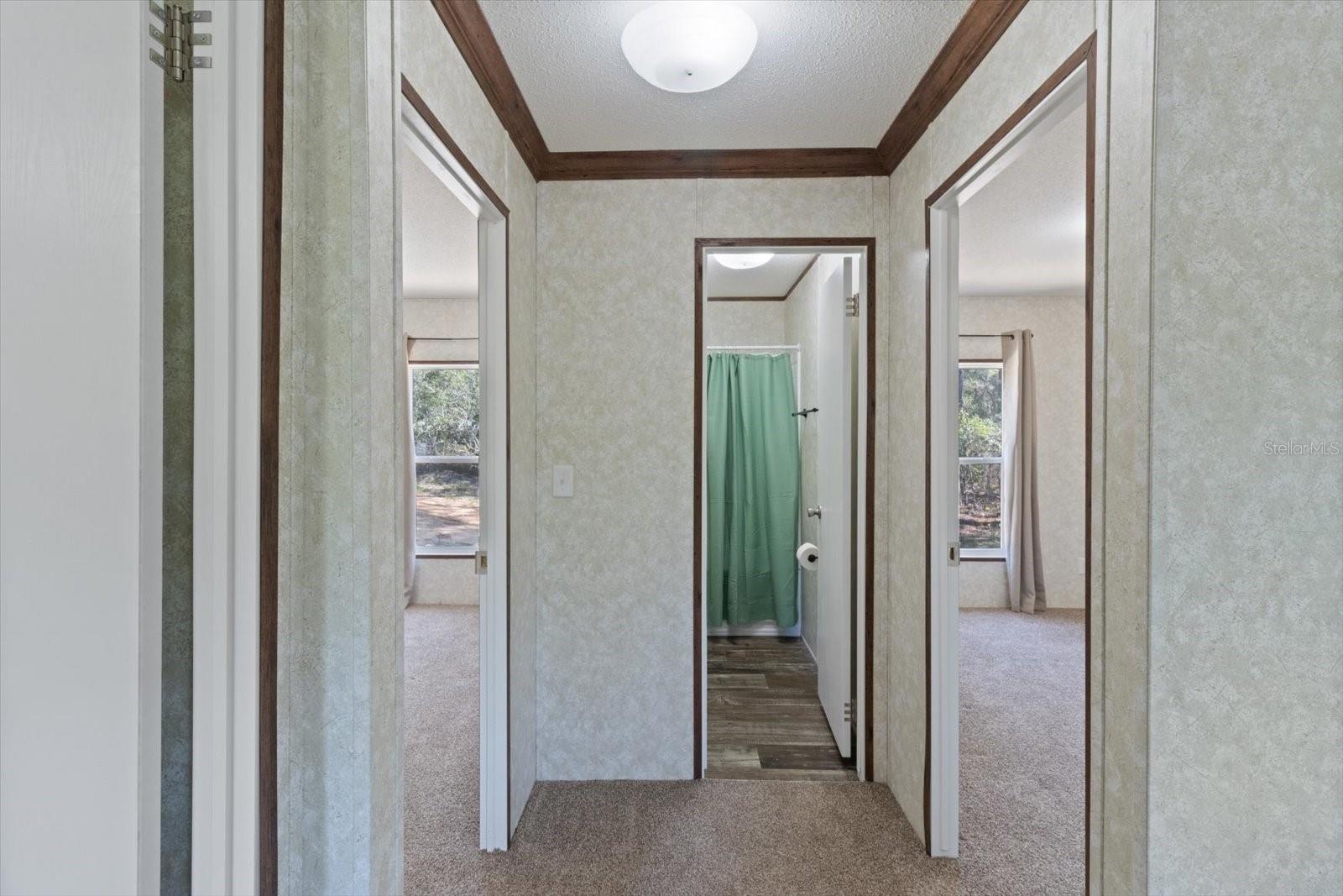 Hallway-Bedroom 2&amp;3 on Left, Bathroom 2 Straight Ahead &amp; Bedroom 4 on Right