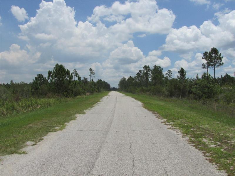 Paved road, rural setting.