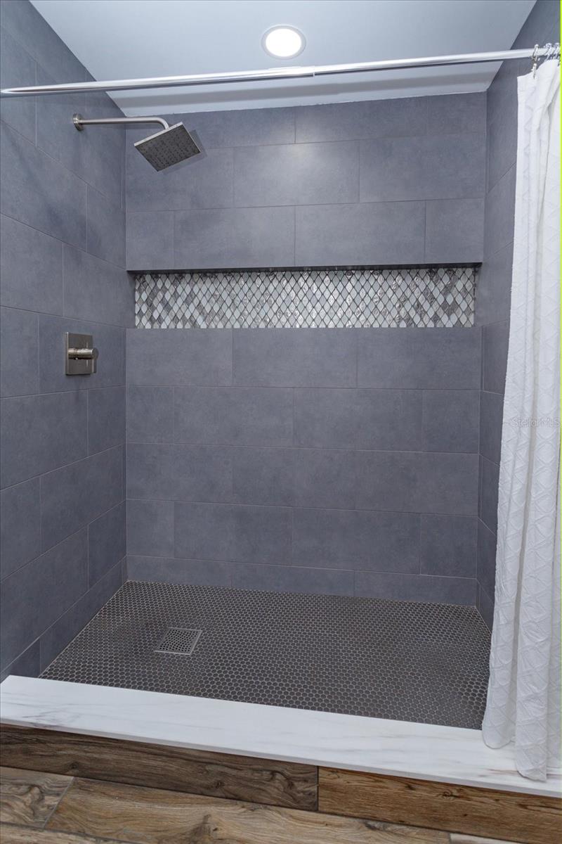 Master shower has been completely renovated.
