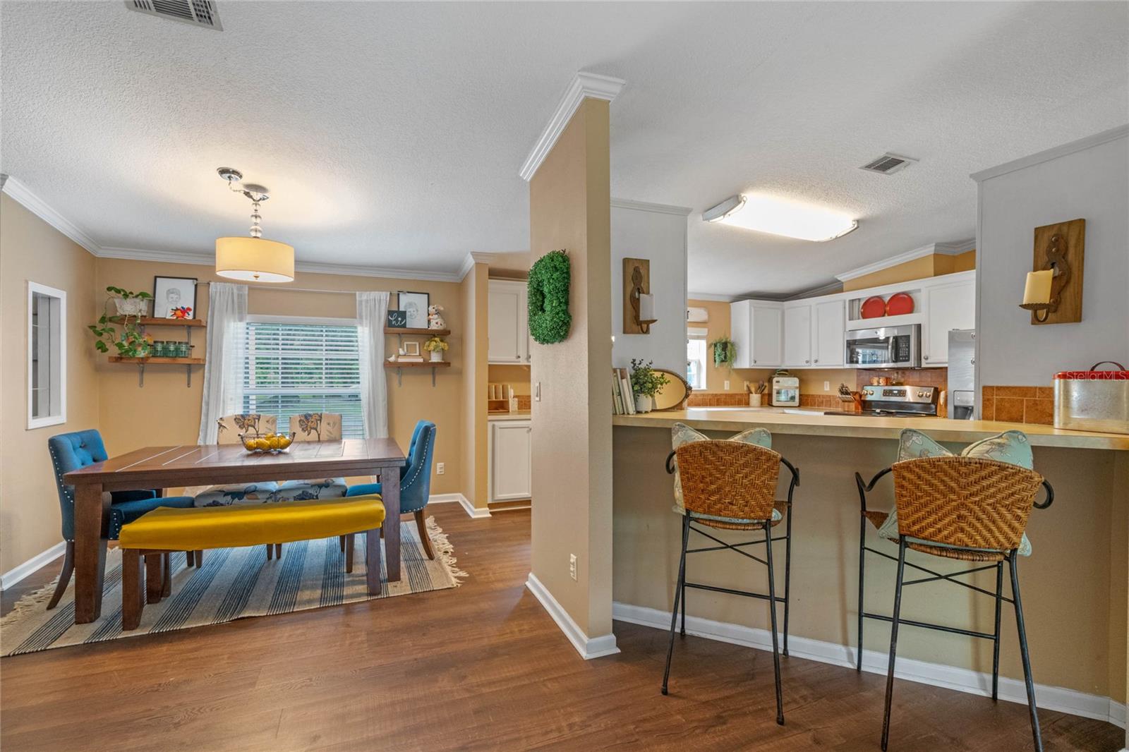 Breakfast bar in the kitchen is the perfect place for morning coffee.
