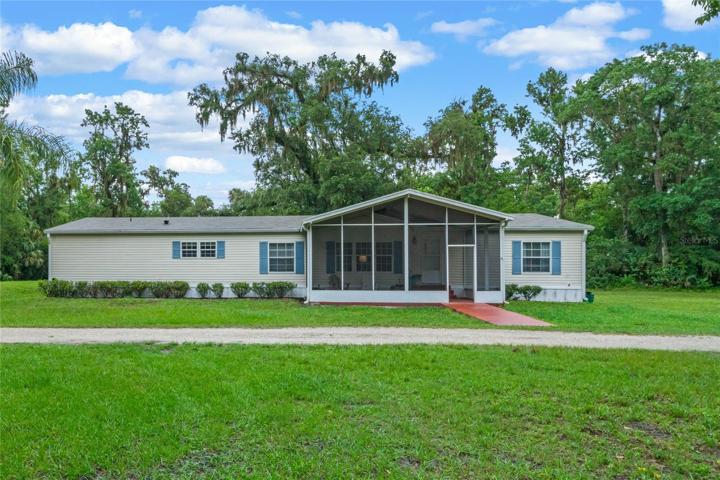 Four bedroom, 3 bath home on 5 acres in Geneva.