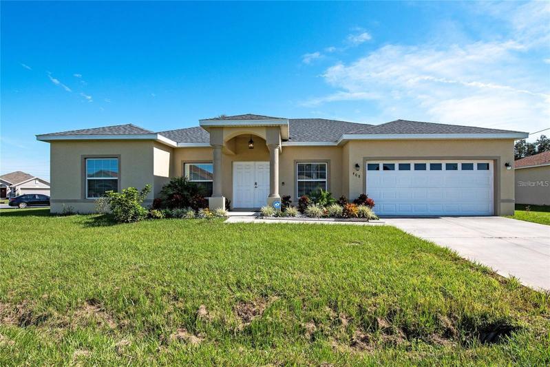 Custom Built Home with Double-Door Entry, 2 Car Garage and Fully Paid Solar Panels