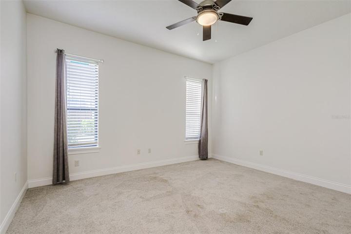 Bedroom 3 as of 9/4/2023 updated interior paint & now vacant.