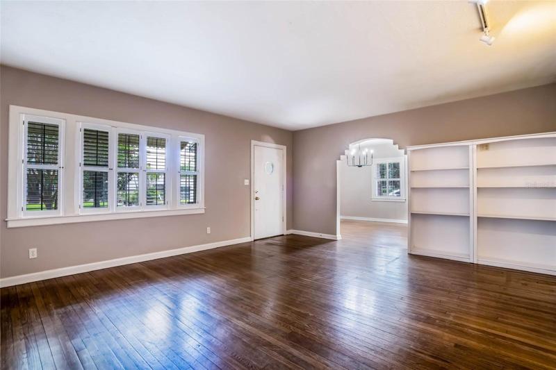 Custom Shelving in Family Room and original hardwood floors