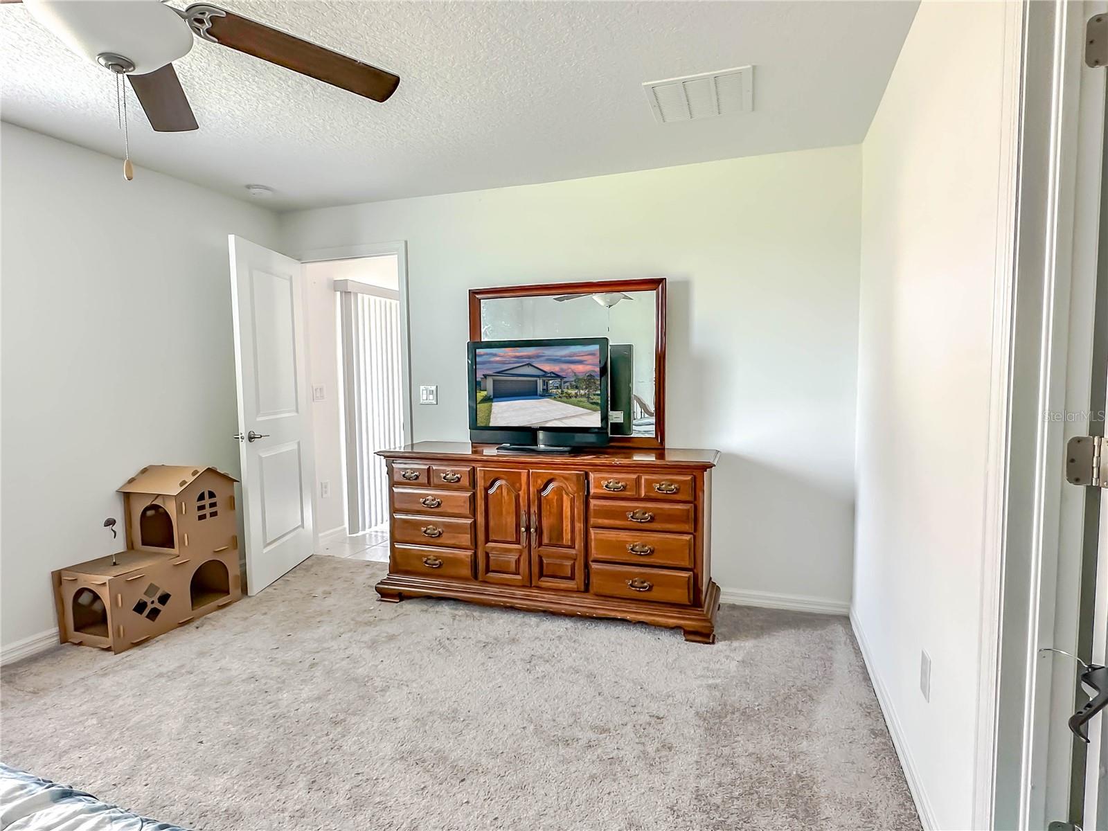 You'll enjoy the en suite bathroom and closet in the spacious master suite.