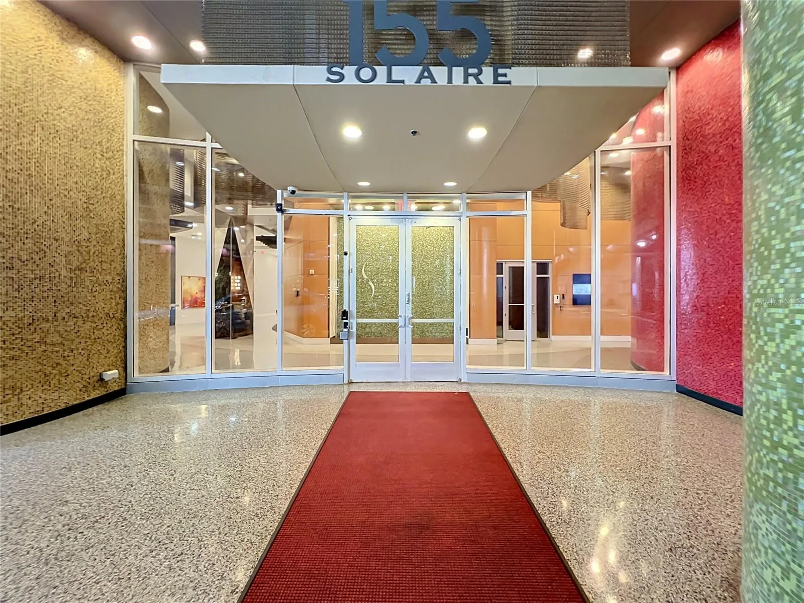 Covered entryway with security features and 24 hour concierge.