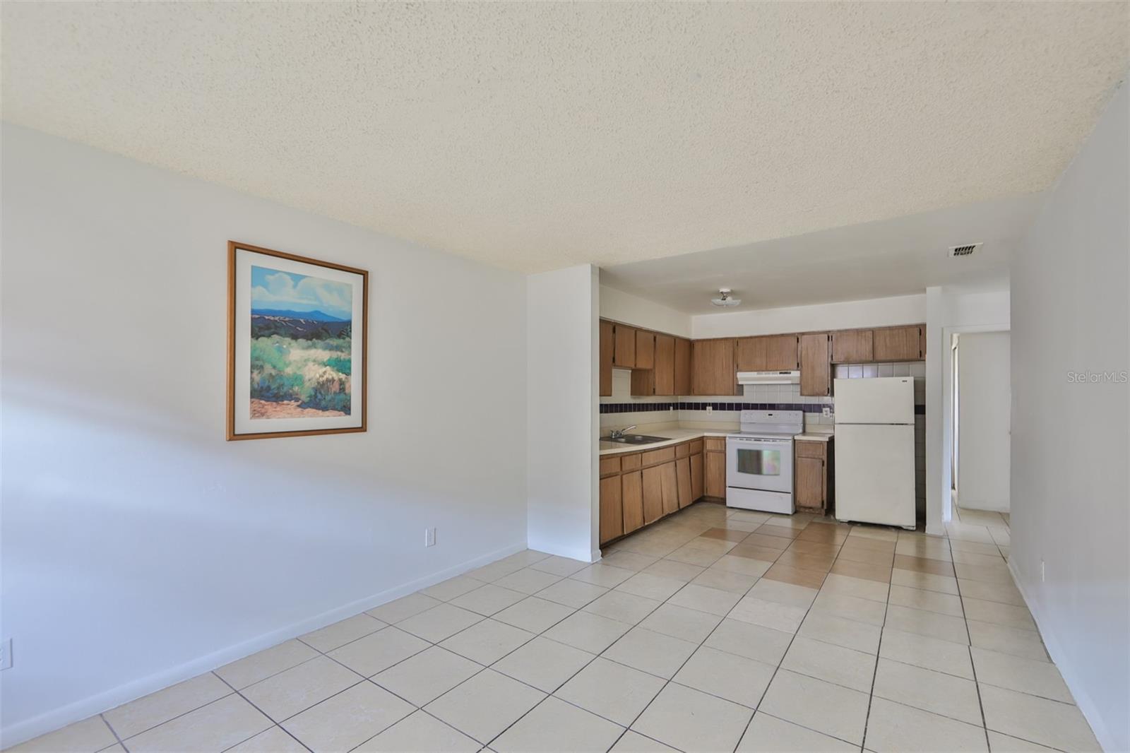 Living Room Opens to Kitchen