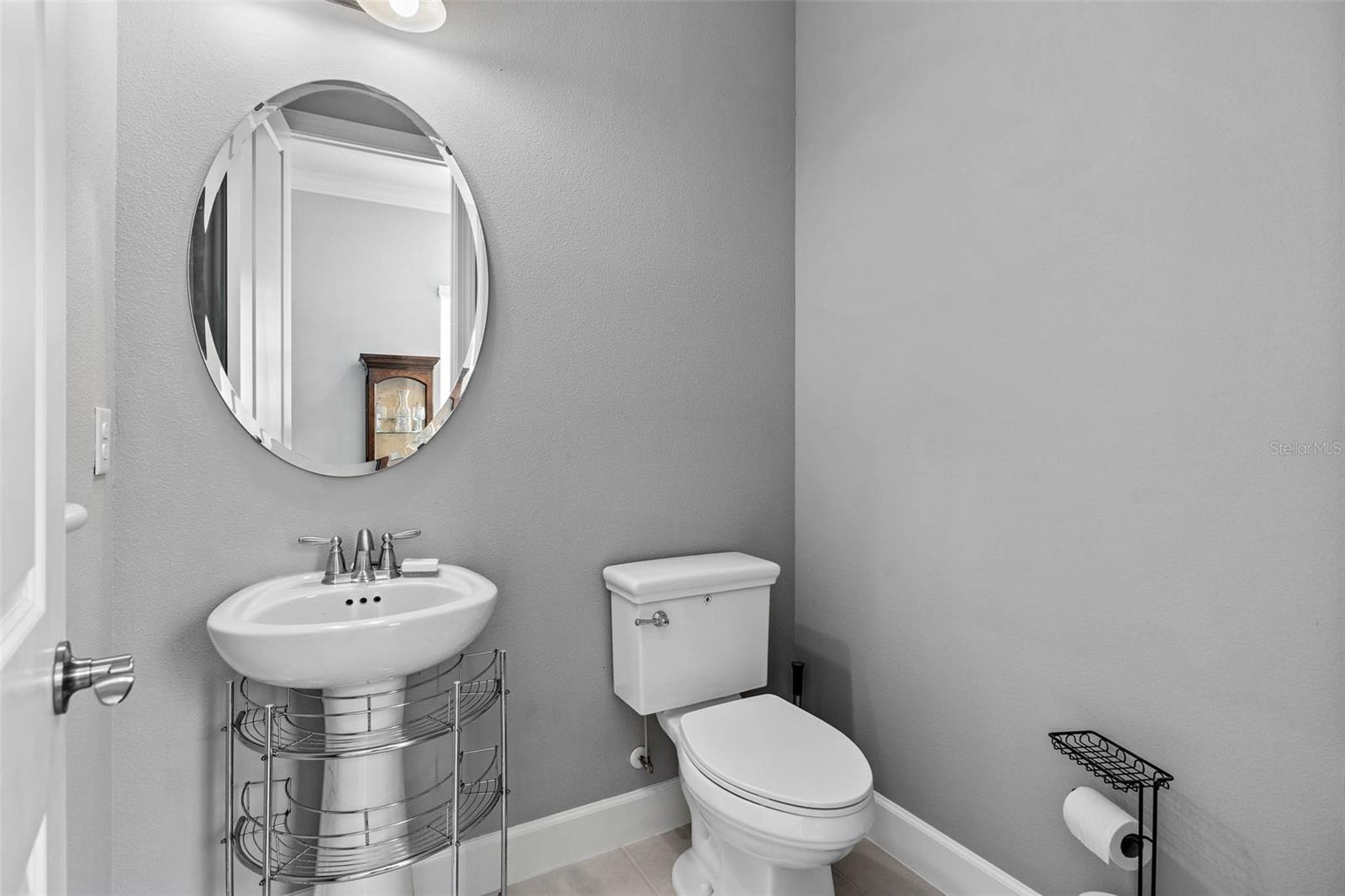 Half Bath adjacent to Foyer