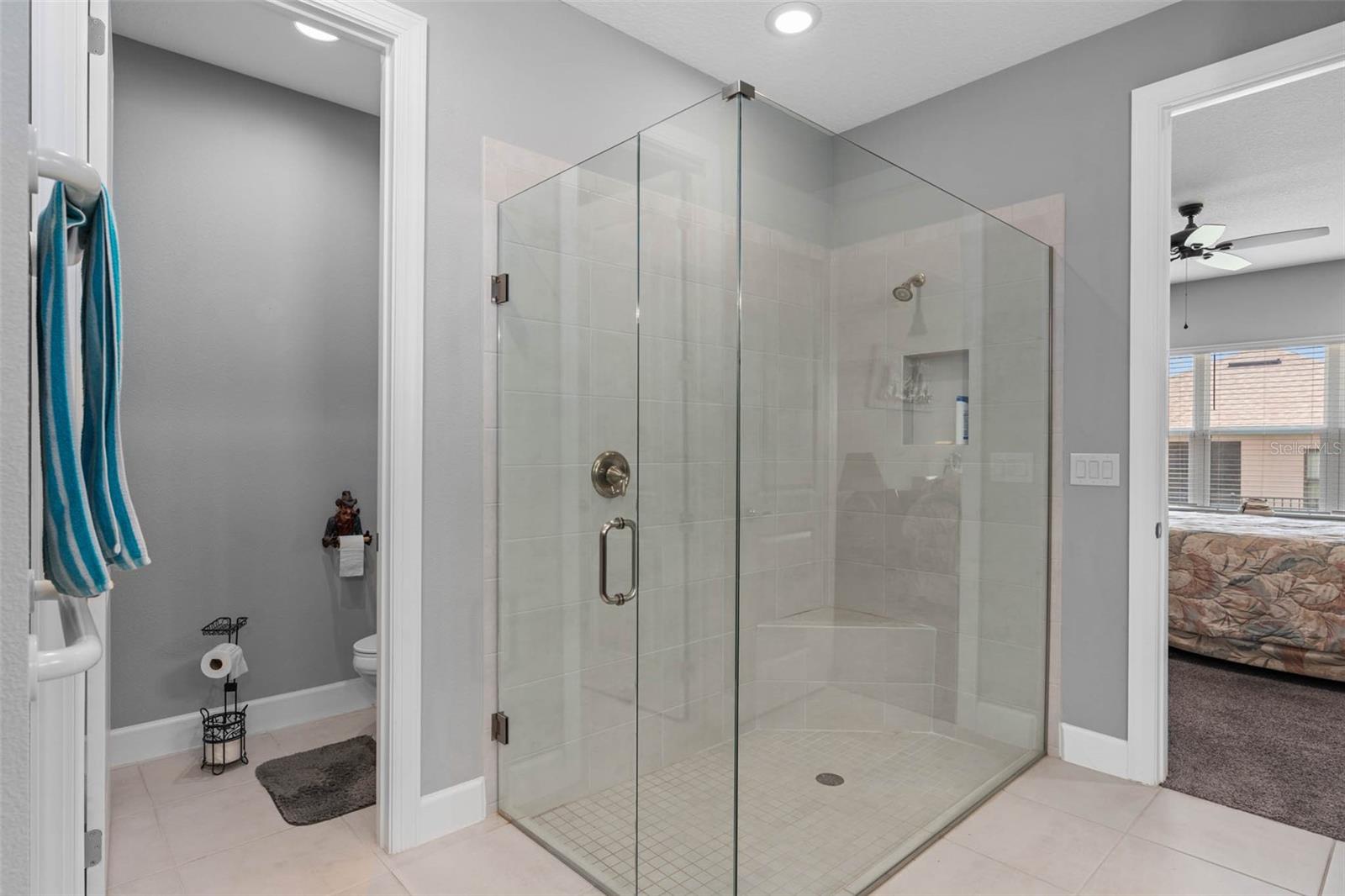 Owners En-Suite Shower with a UPGRADED Frameless Shower Enclosure and the Water Closet
