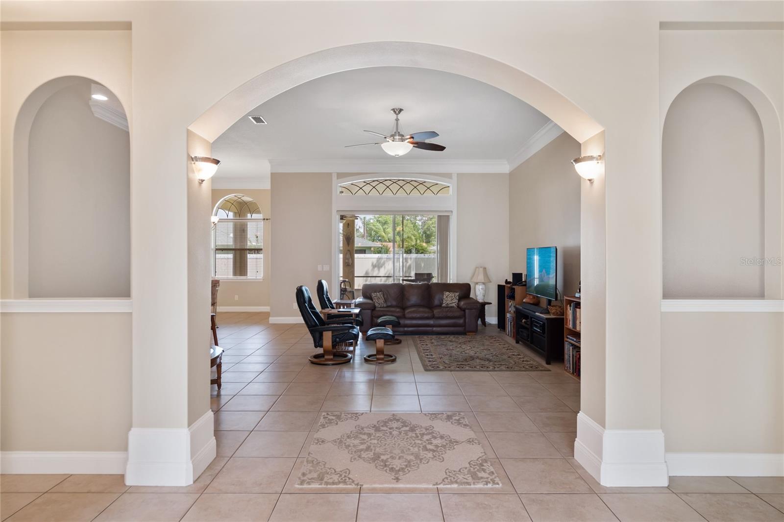 Beautiful arches throughout. View in to family room