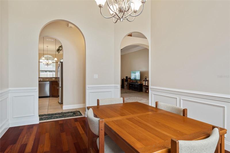 View from the dining room through arched doorways