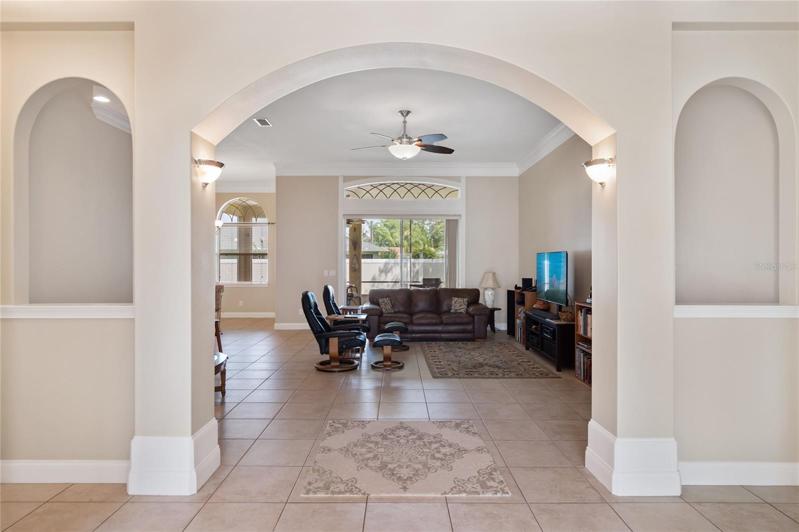 Beautiful arches throughout. View in to family room
