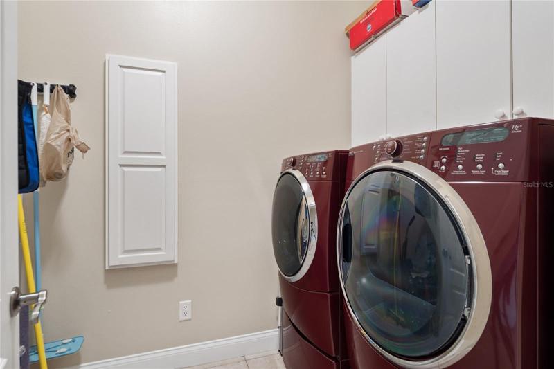 Laundry room w/built in ironing board
