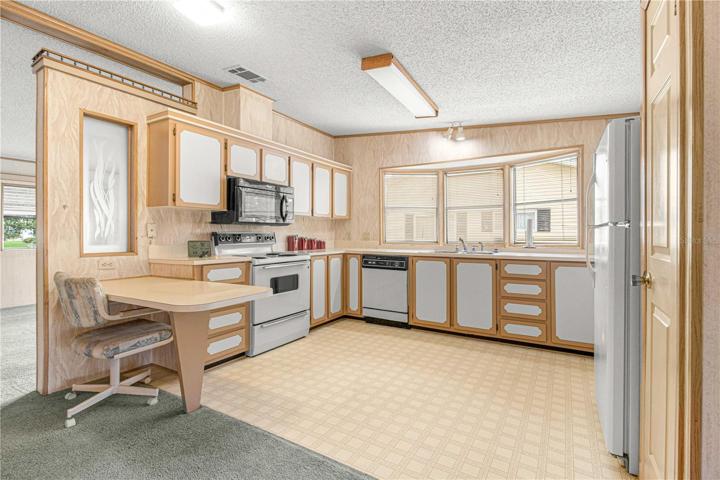 SPACIOUS KITCHEN.