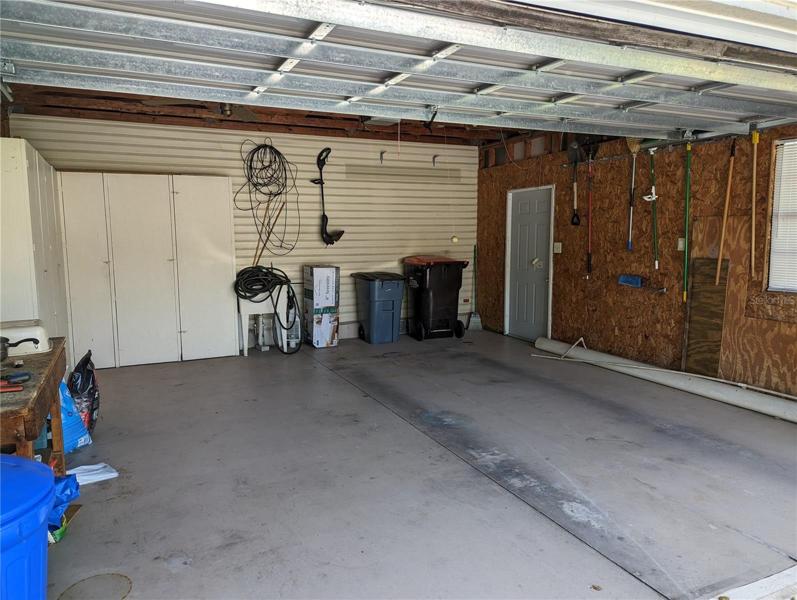 2 CAR GARAGE WITH STORAGE AND SIDE DOOR.