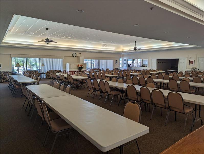 AUDITORIUM. KITCHEN ON RIGHT