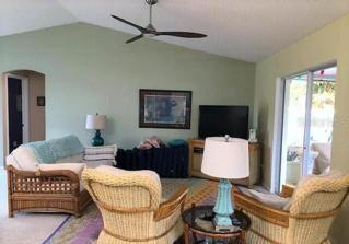 Spacious living area with sliders to screened porch!