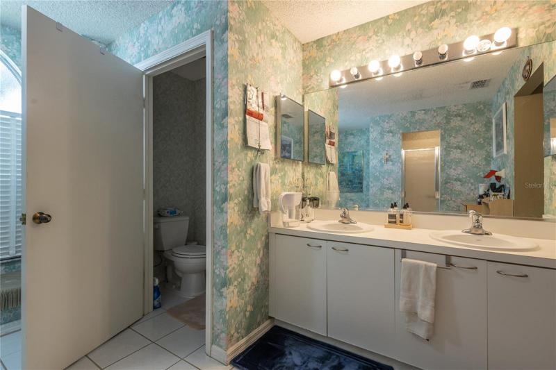 Master bathroom, his/hers.