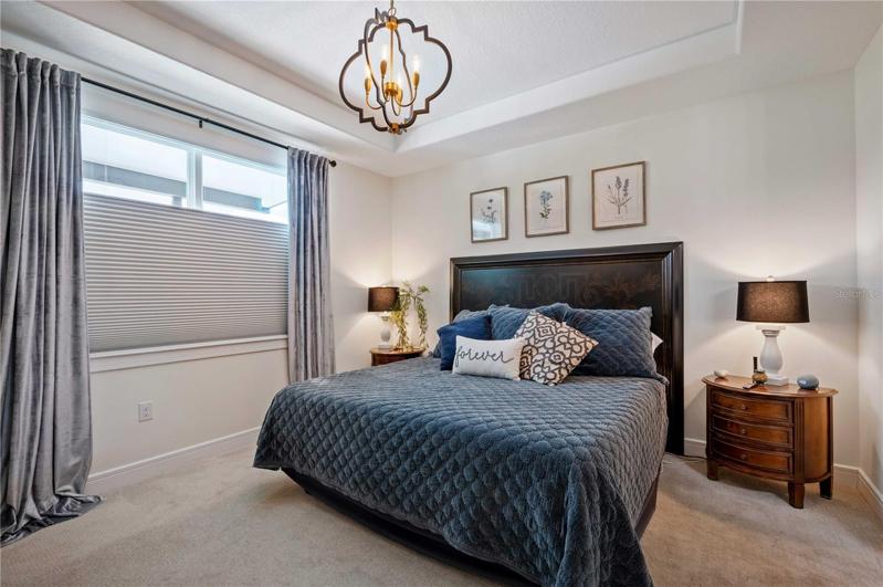 This master is located on the golf view side of this split plan home.