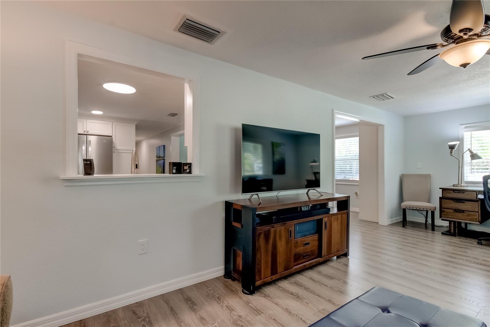 Convenient Serving Window Connects Kitchen to Living Room Tastefully!
