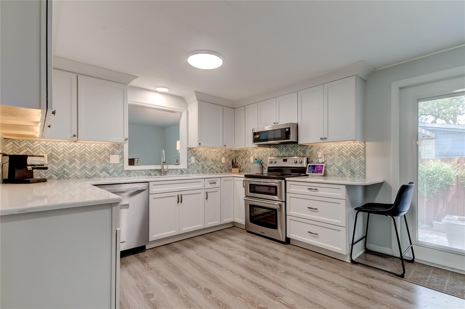 Side Door Exits to a Convenient Outdoor Open Patio Dining Area = $5k Investment!!