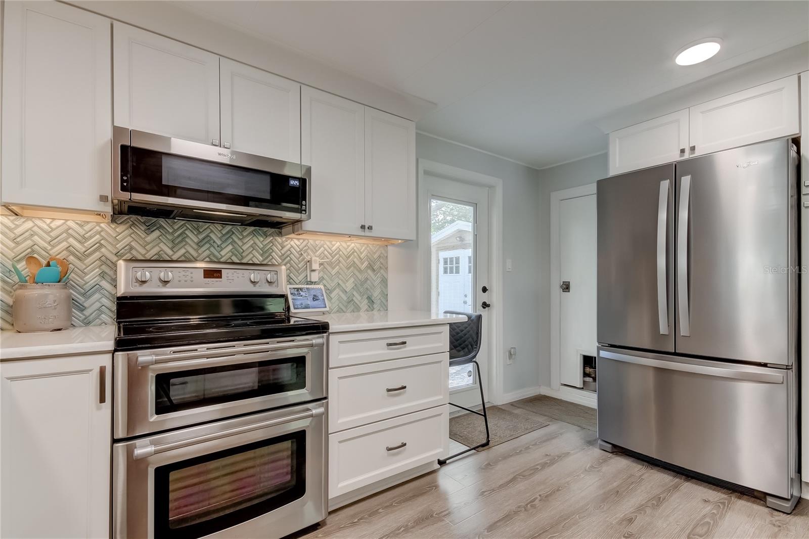 Step In Utility Closet Next to Fridge Can Be Utilized as Walk In Pantry!