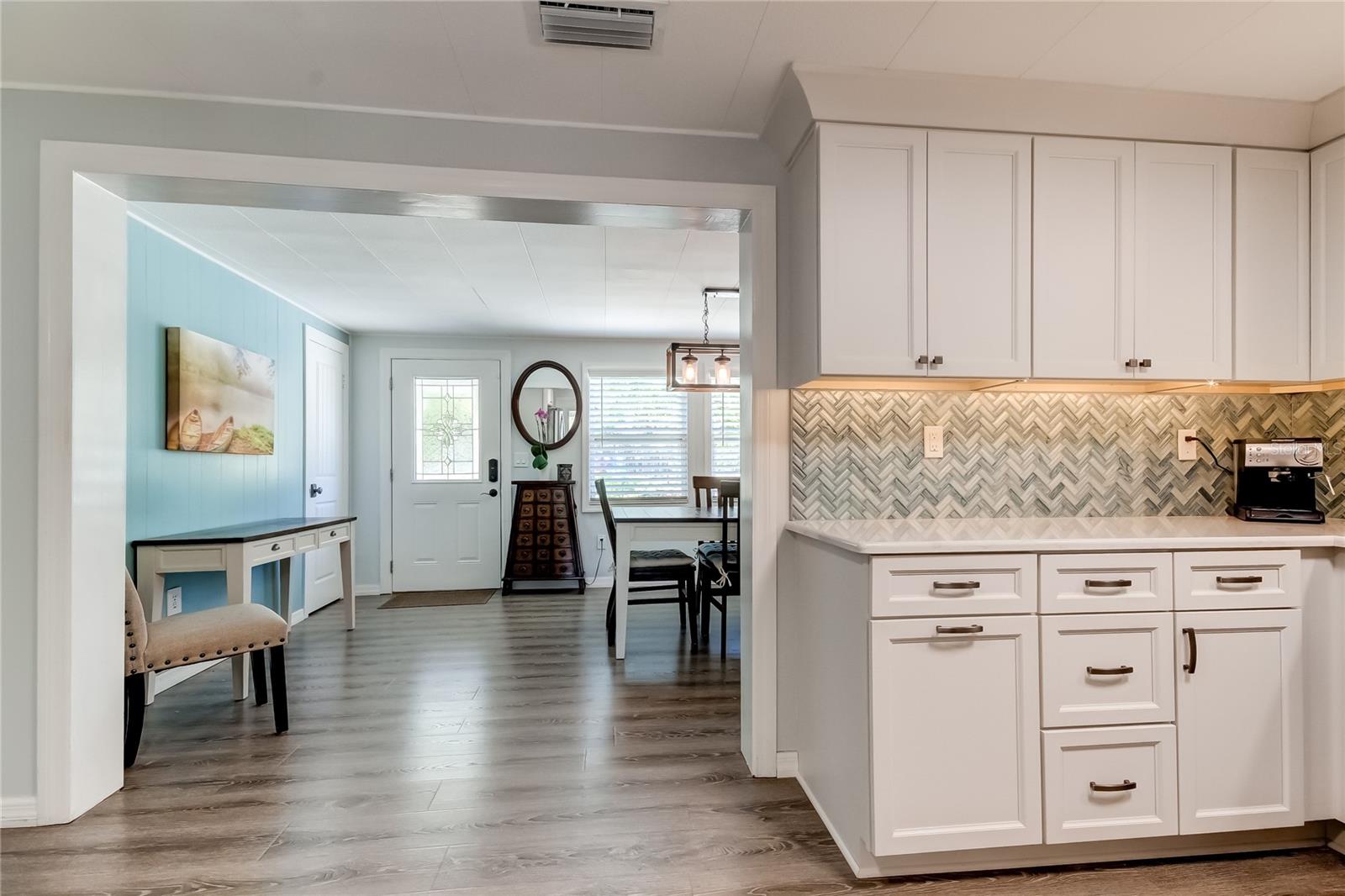 Enlarged Opening Creates a Seamless Feel From Dining Room to Kitchen!