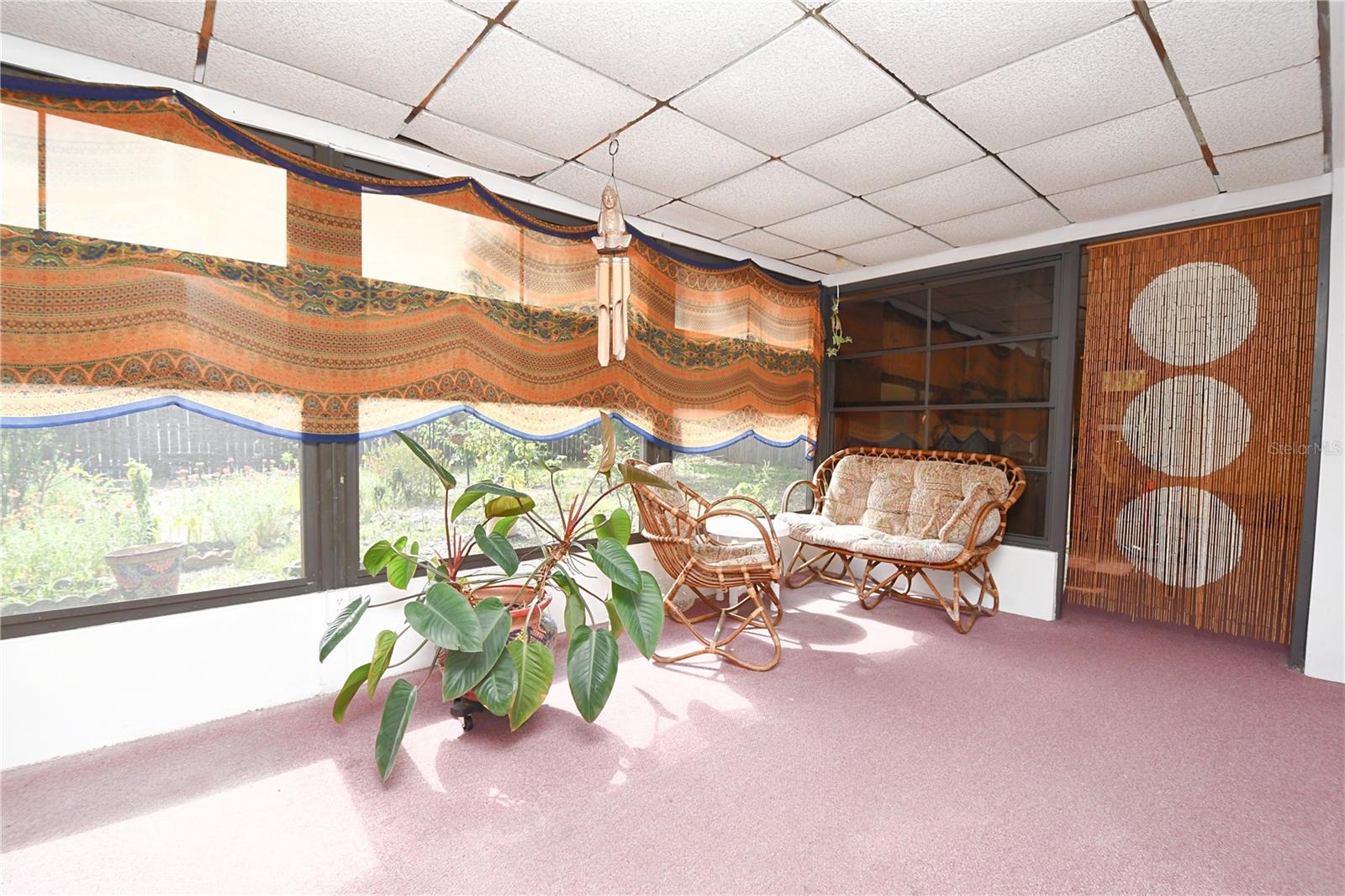 The screen room is quintessential Florida living at its finest!