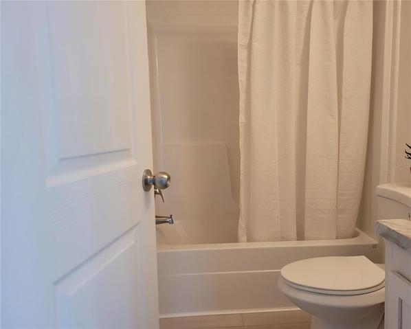 GUEST BATH TUB WITH SHOWER