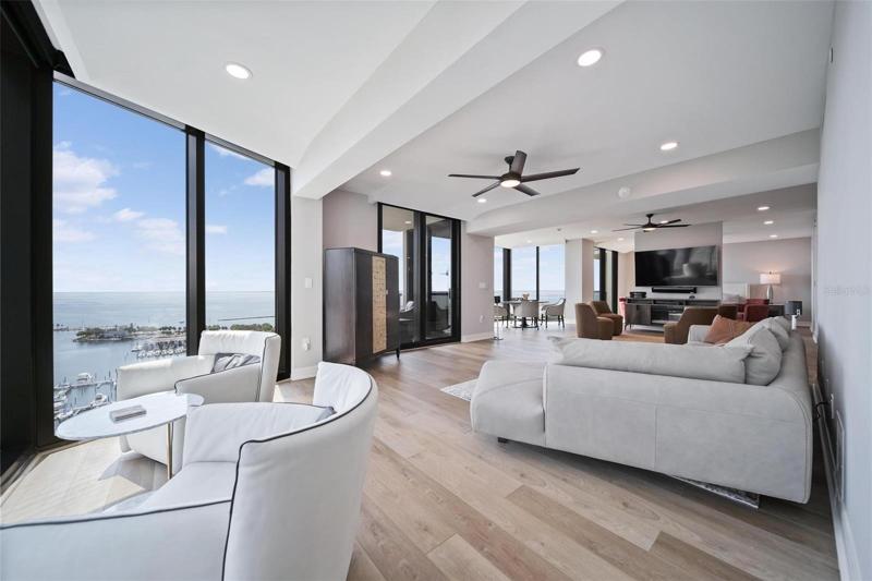 Prepare to be captivated by the magnificent makeover of this sumptuous contemporary condo, where every detail has been meticulously redesigned to create an extraordinary living experience.