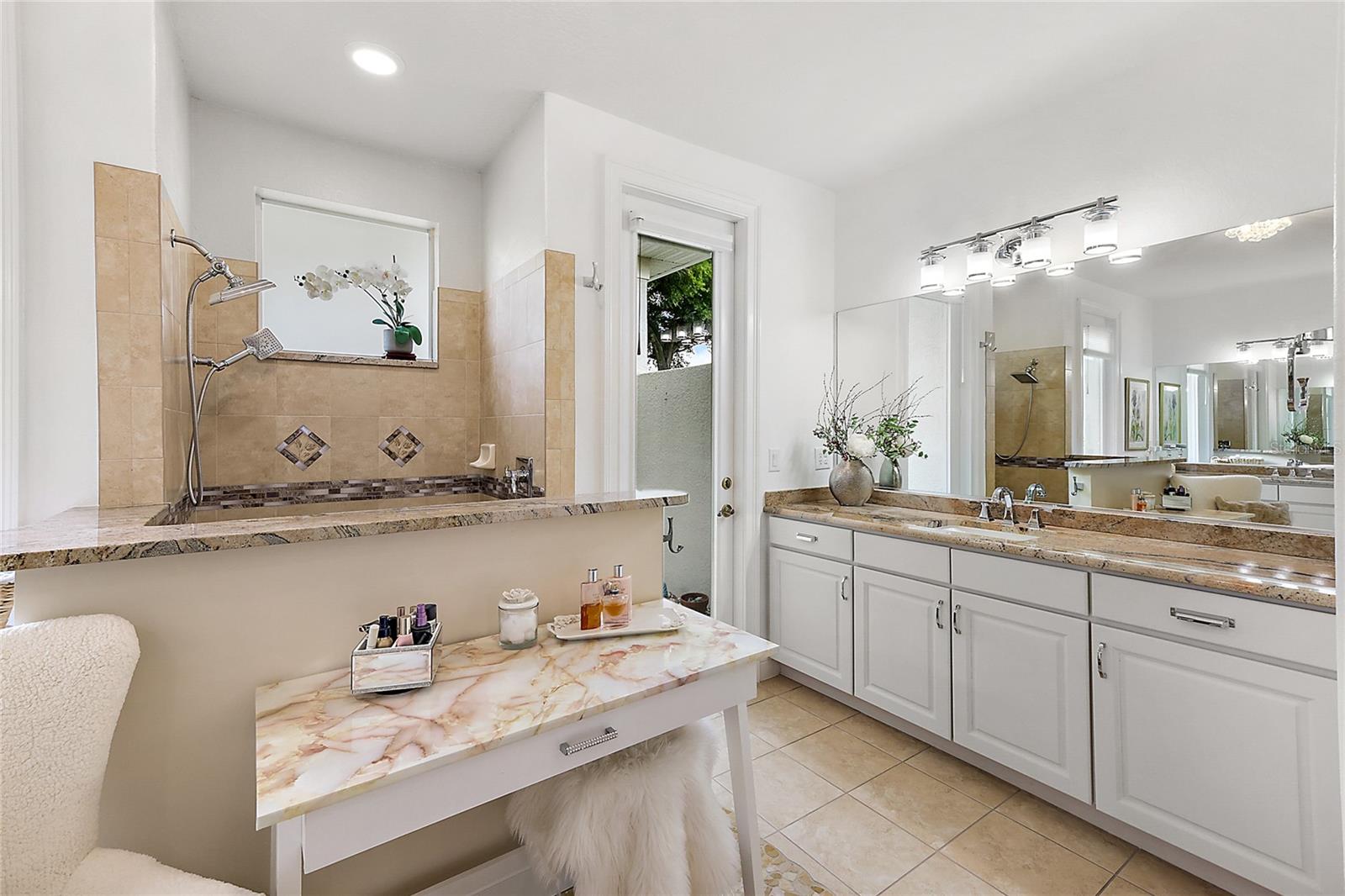 Master Bathroom with Vanity Area and Linen Closet