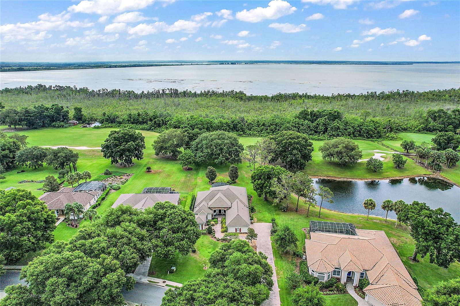 Aerial of Property with Golf Course and Lake Views