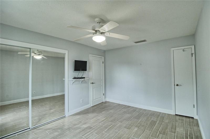 Second bathroom with tub and shower