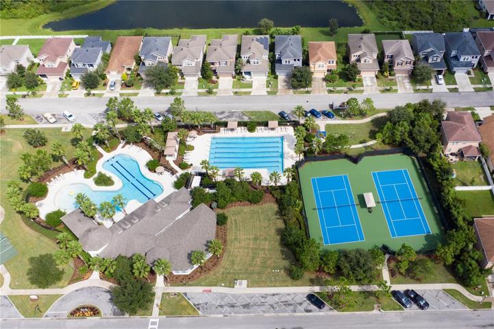 Main Pool's and Clubhouse with Tennis courts & Playground