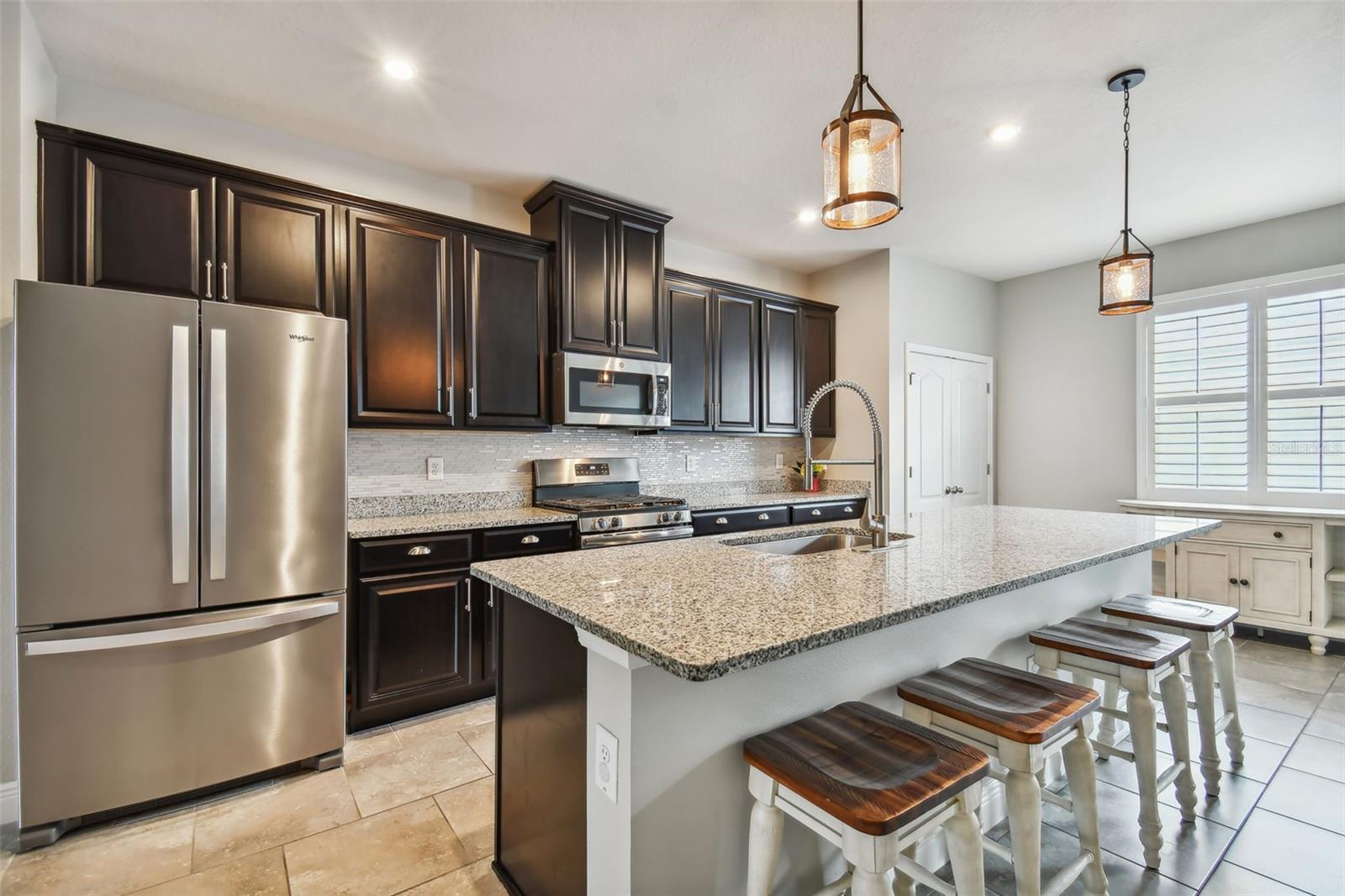 Counter height bar, stainless appliances