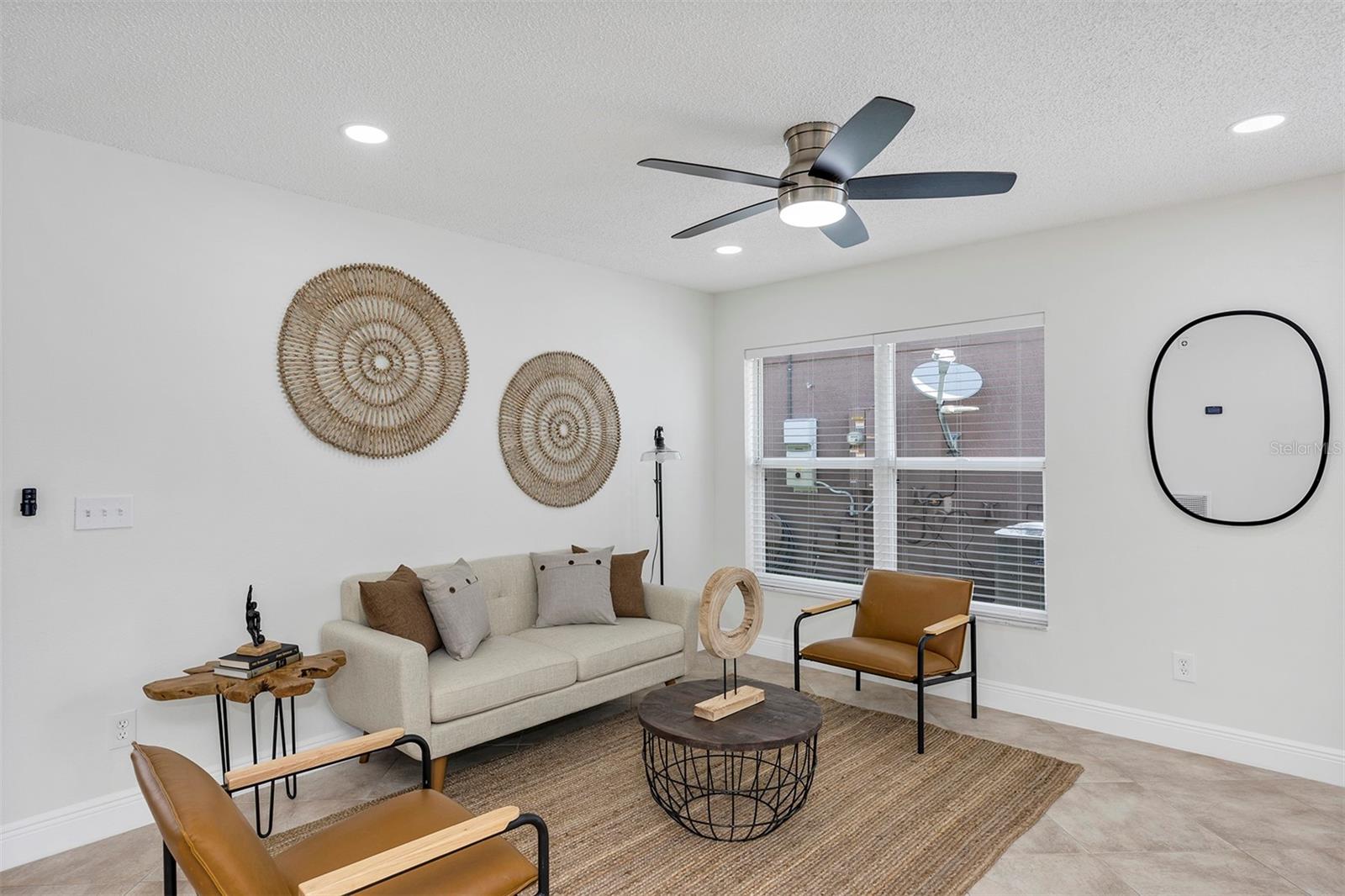 Note the details in this living space. There are built-in LED lights, remote controlled light fixtures and ceramic tiles all over the house.