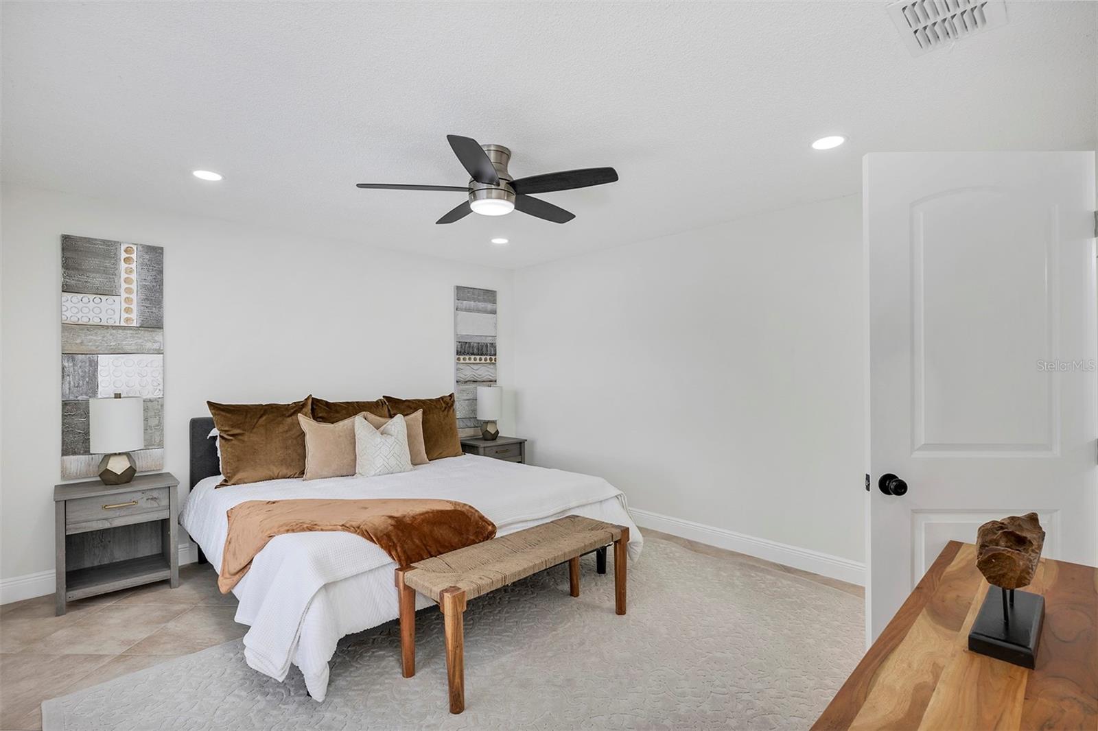 Master bedroom with ceramic tiles, ceiling fans, LED lights, freshly painted and much much more.