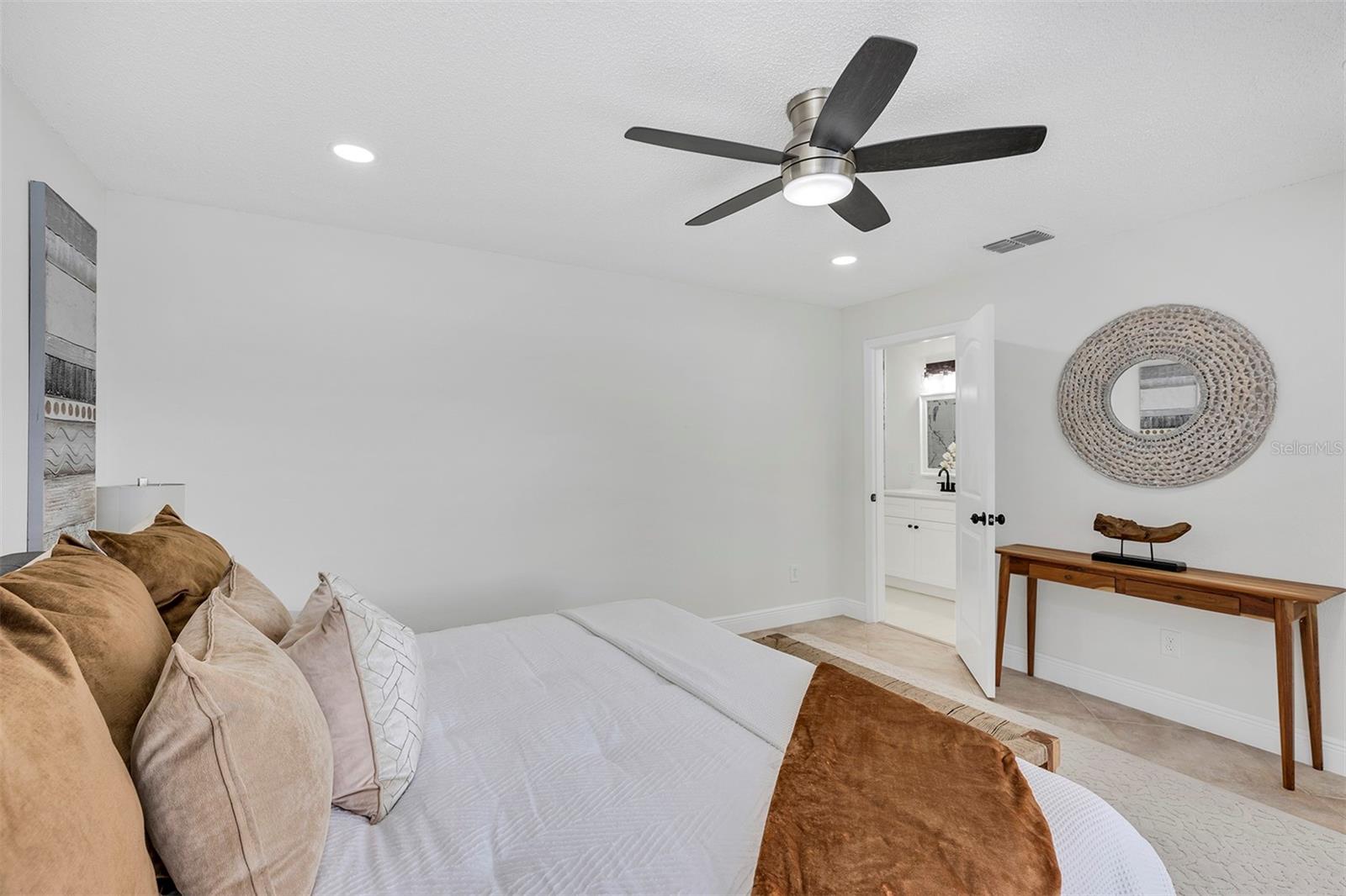 View of the gorgeous bathroom from the master bedroom.