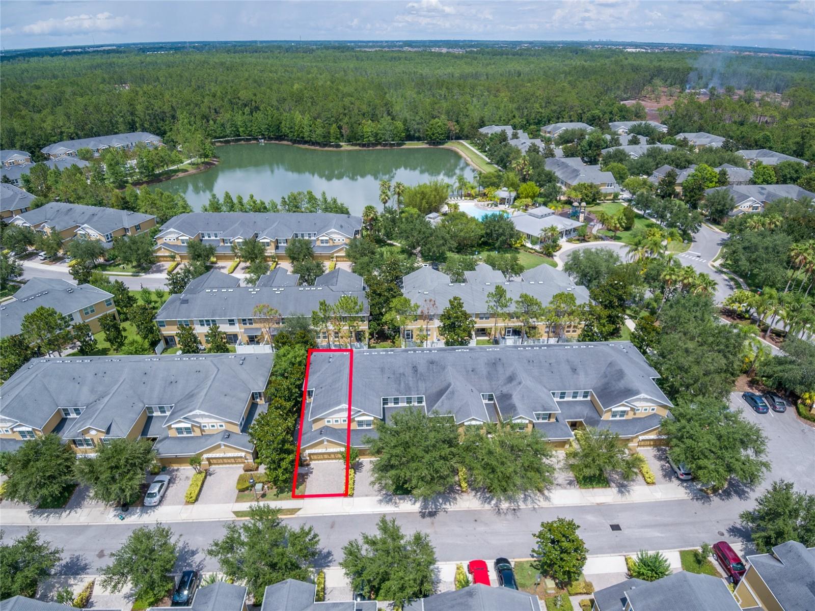 Aerial with lake and amenities in background