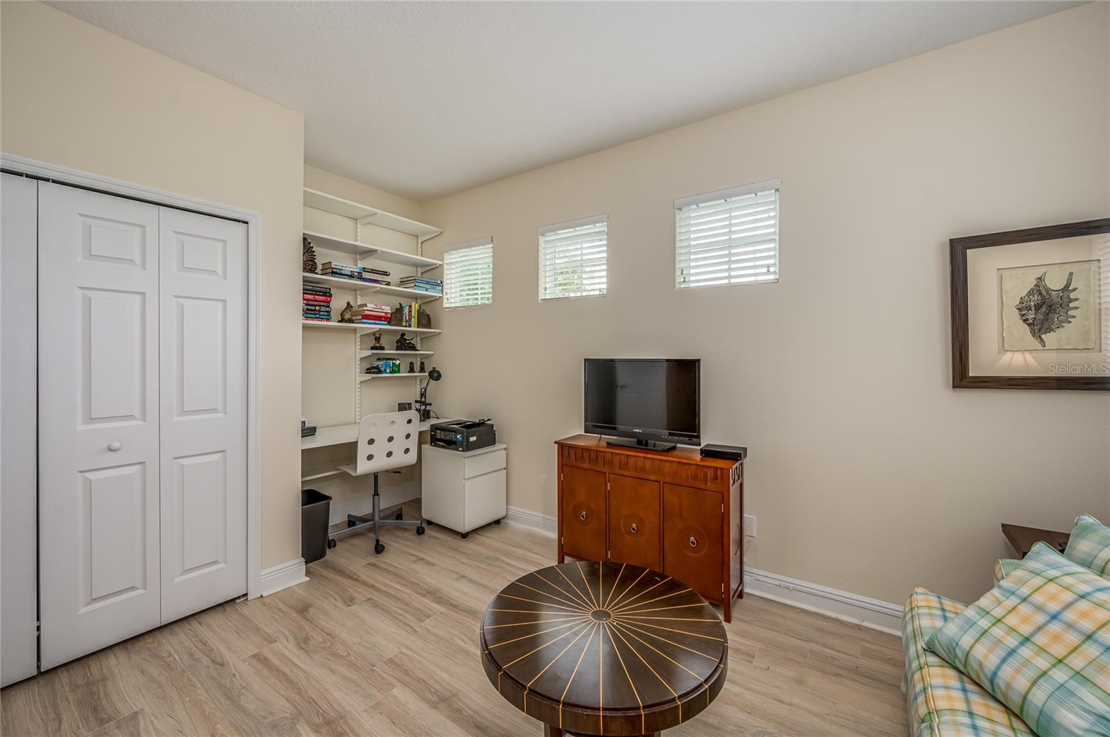 Front bedroom (upstairs) with built-in work area