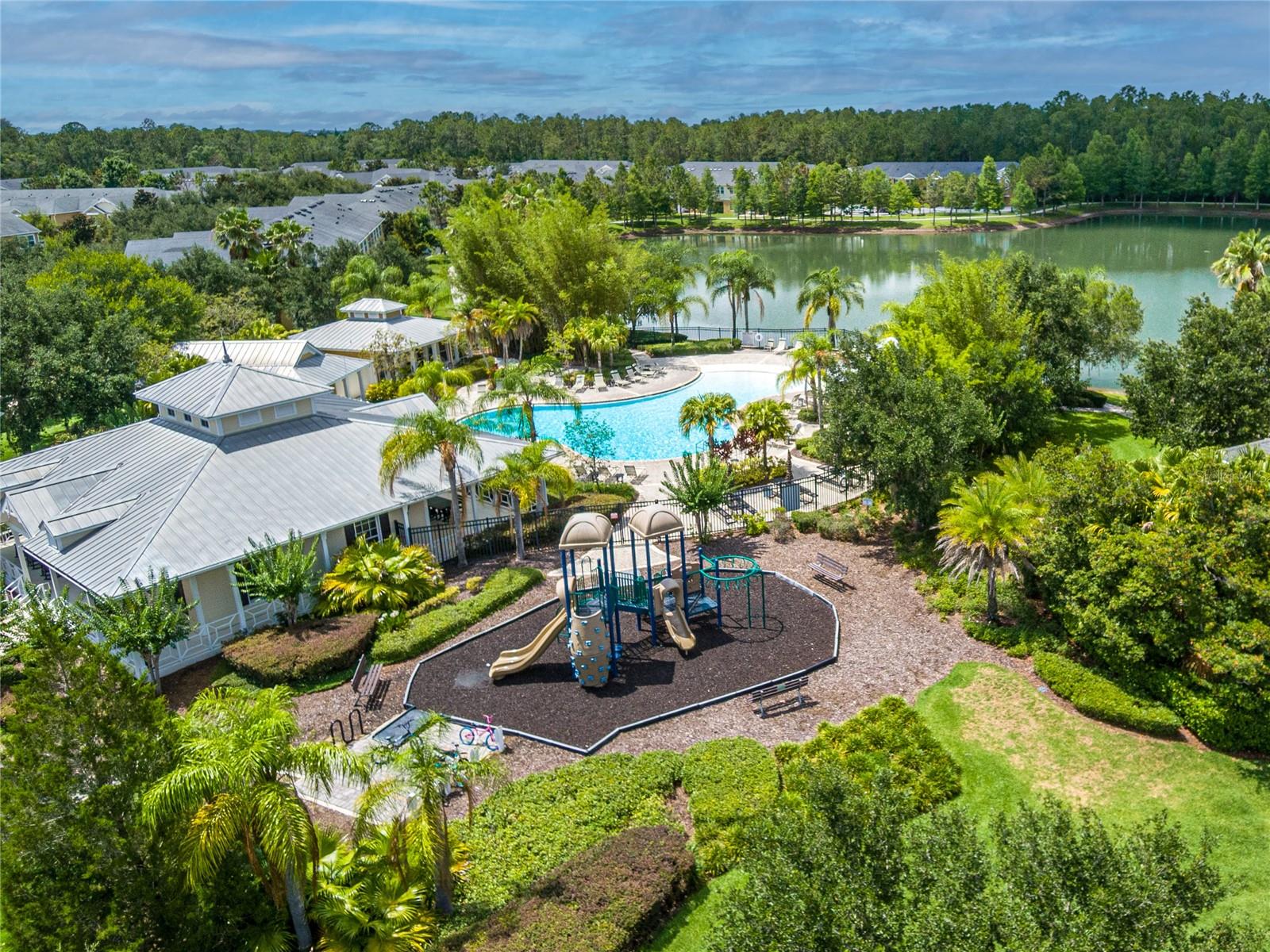 Clubhouse, fitness center, tot lot / playground, lakeside beach-entry pool
