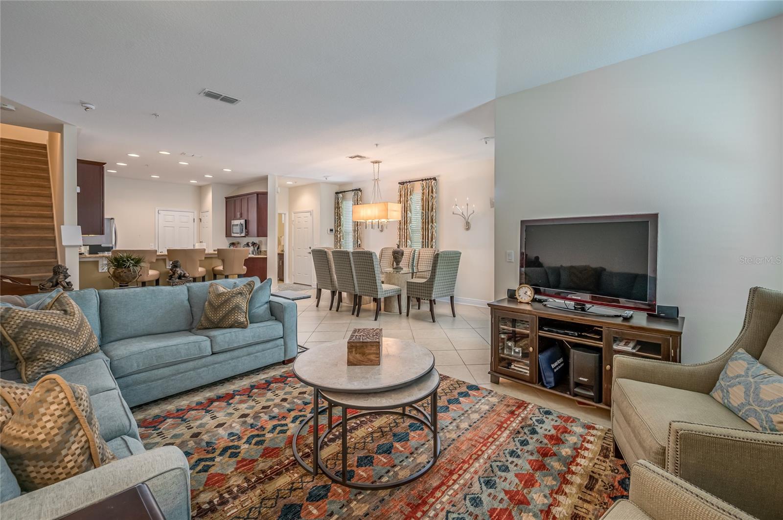 Living room facing dining room and kitchen