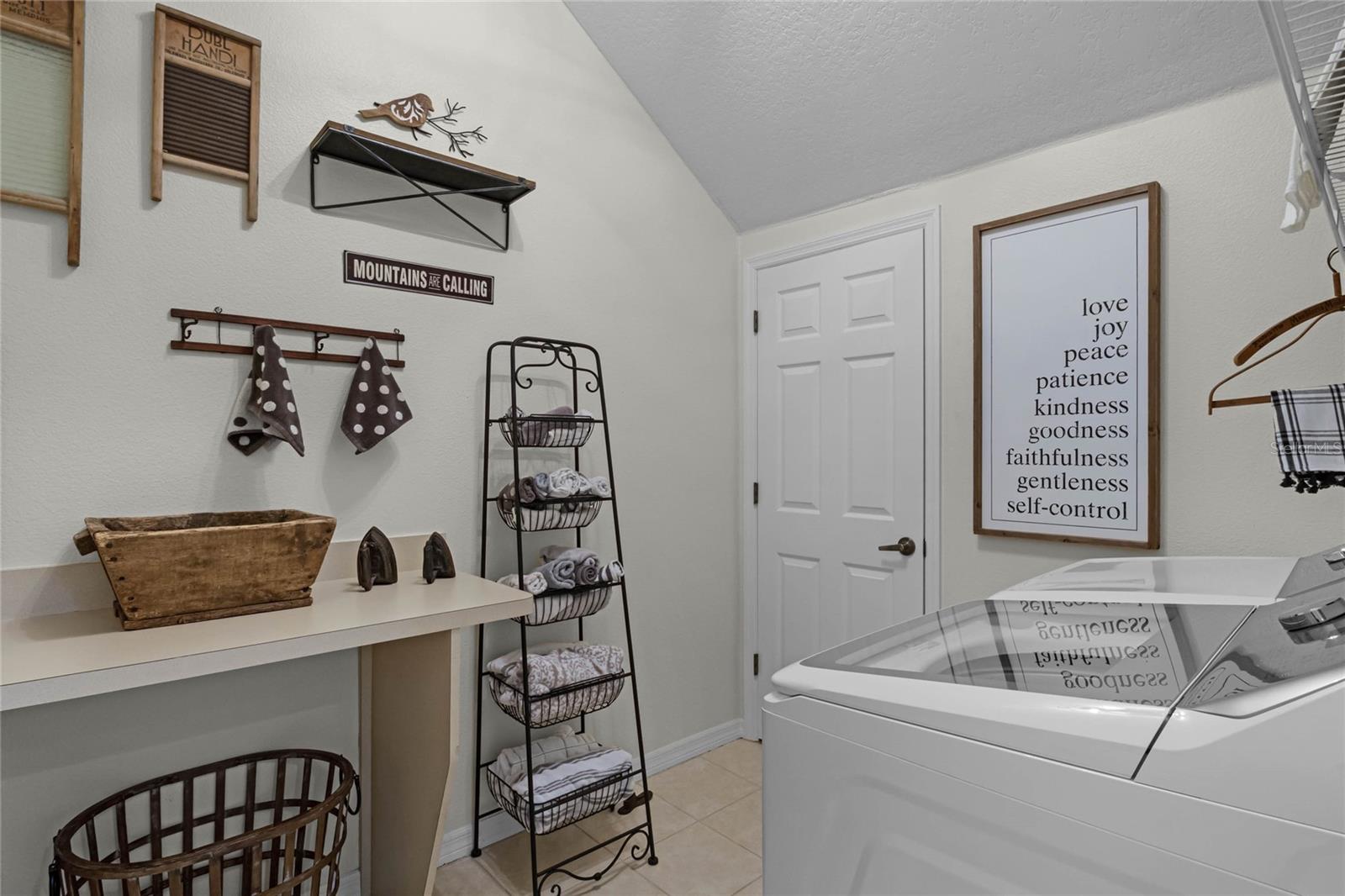 Owner's Laundry 3rd Level off Bathroom more storage behind door
