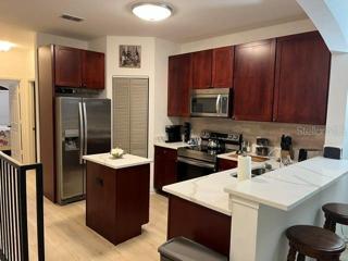 Open Kitchen with Island and Bar Seating