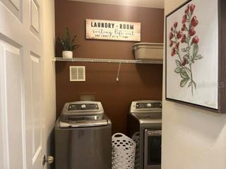 Spacious 7'x 6' laundry room which has it's own closet