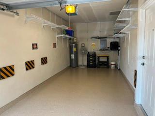 Super clean Garage with Epoxy Paint Flooring
